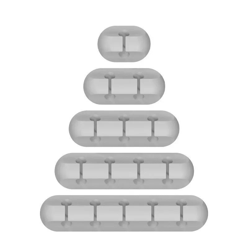 A stack of silicone cable organizers or winders, showing various sizes and shapes.