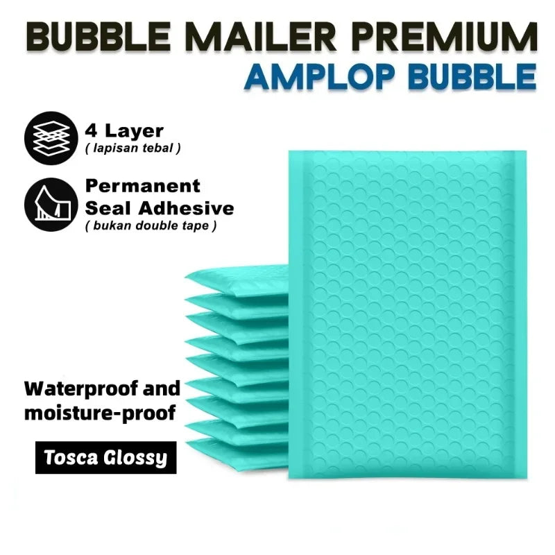 A stack of teal bubble mailers with a glossy finish, showing four layers and permanent seal adhesive.