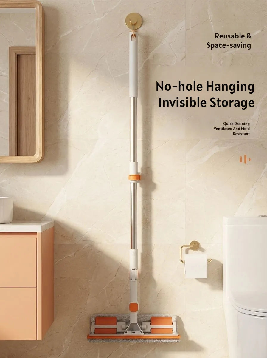 A silver double-sided window cleaning tool with a squeegee and extension handle is shown hanging on a wall.