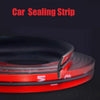 A roll of red and black car sealing strip used for weatherproofing vehicle gaps.