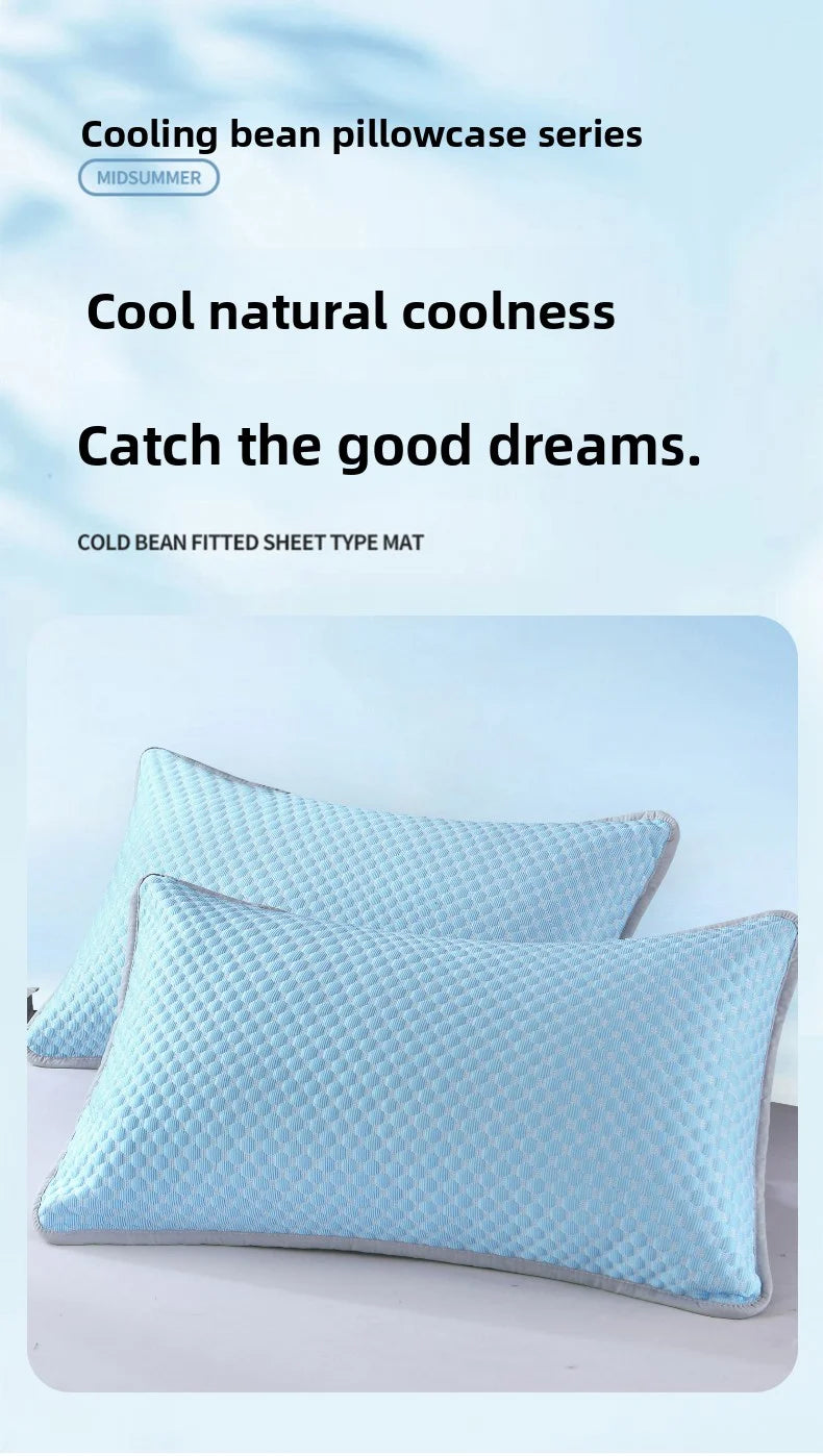 Light blue cooling bean pillowcases and a fitted sheet type mat displayed on a white surface.