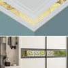 Gold Greek key pattern acrylic mirror wall stickers applied to a white wall molding and cabinet door.