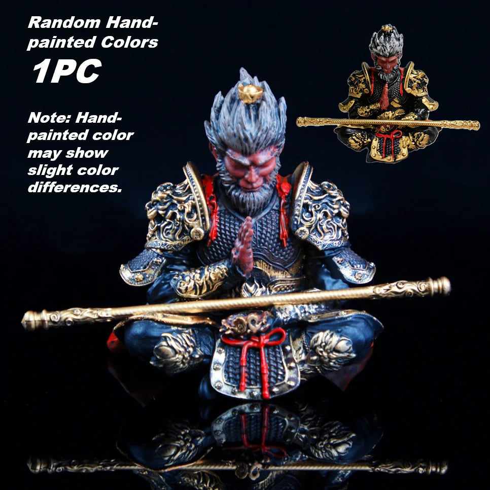 Hand-painted Monkey King figurine seated with staff and a separate figure in the background