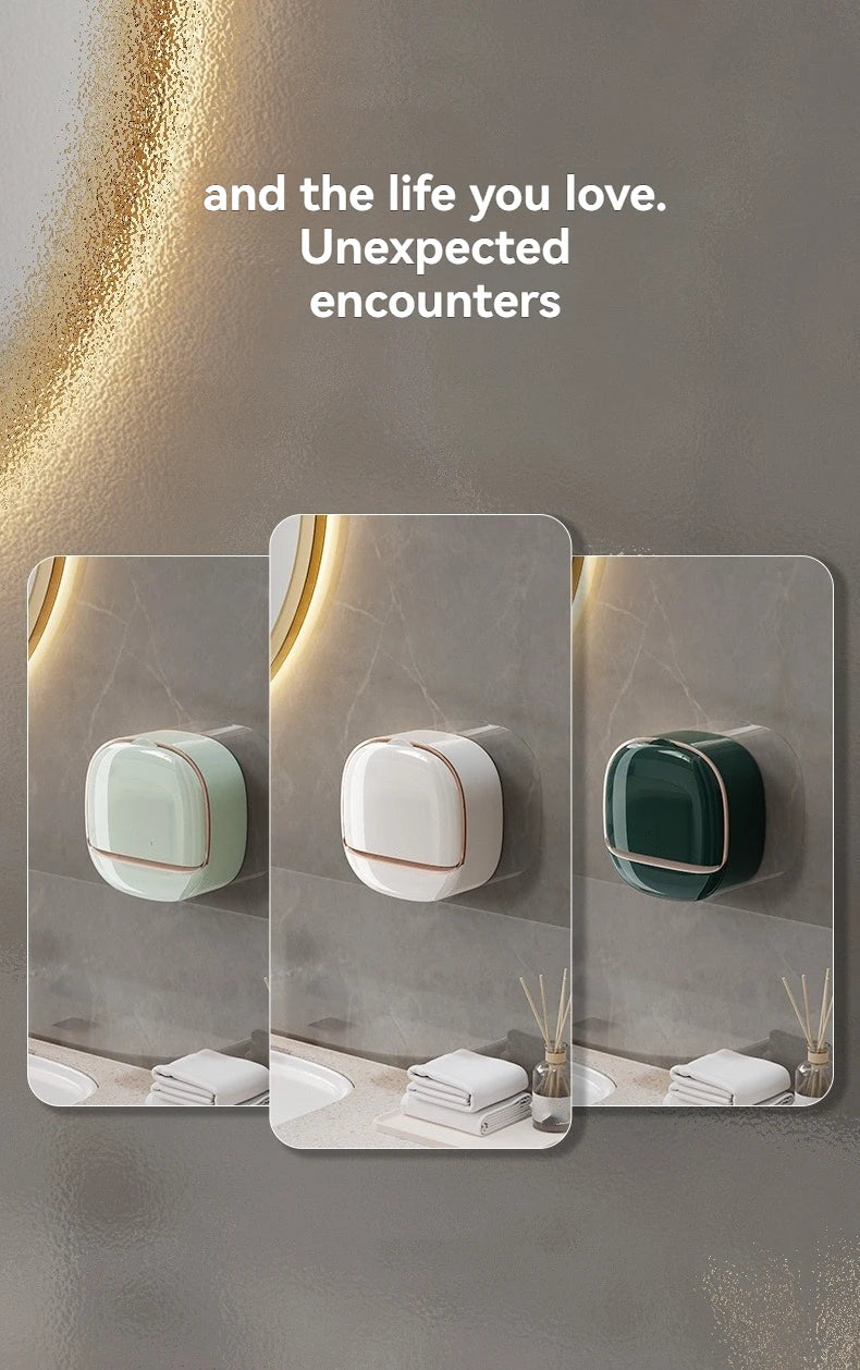 Wall-mounted ABS soap dish with lid in white, light green, and dark green colors mounted on a gray wall.