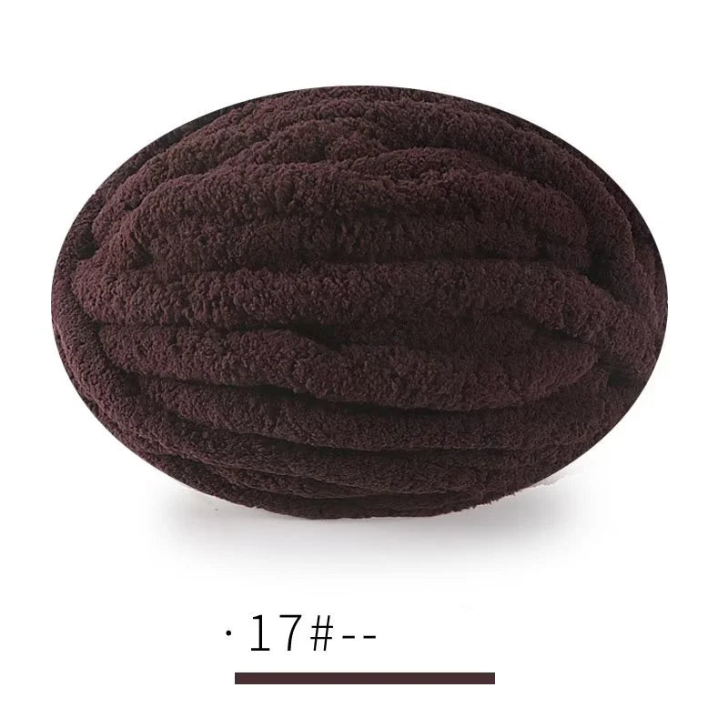 A ball of dark brown extra thick chenille yarn for hand knitting