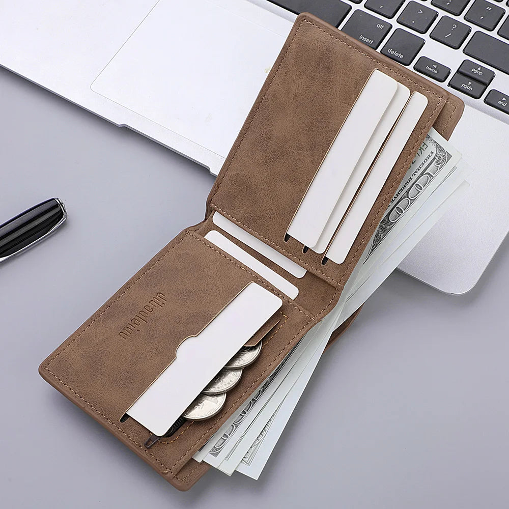 A brown PU leather wallet with multiple card slots and a coin pocket resting on a laptop keyboard.