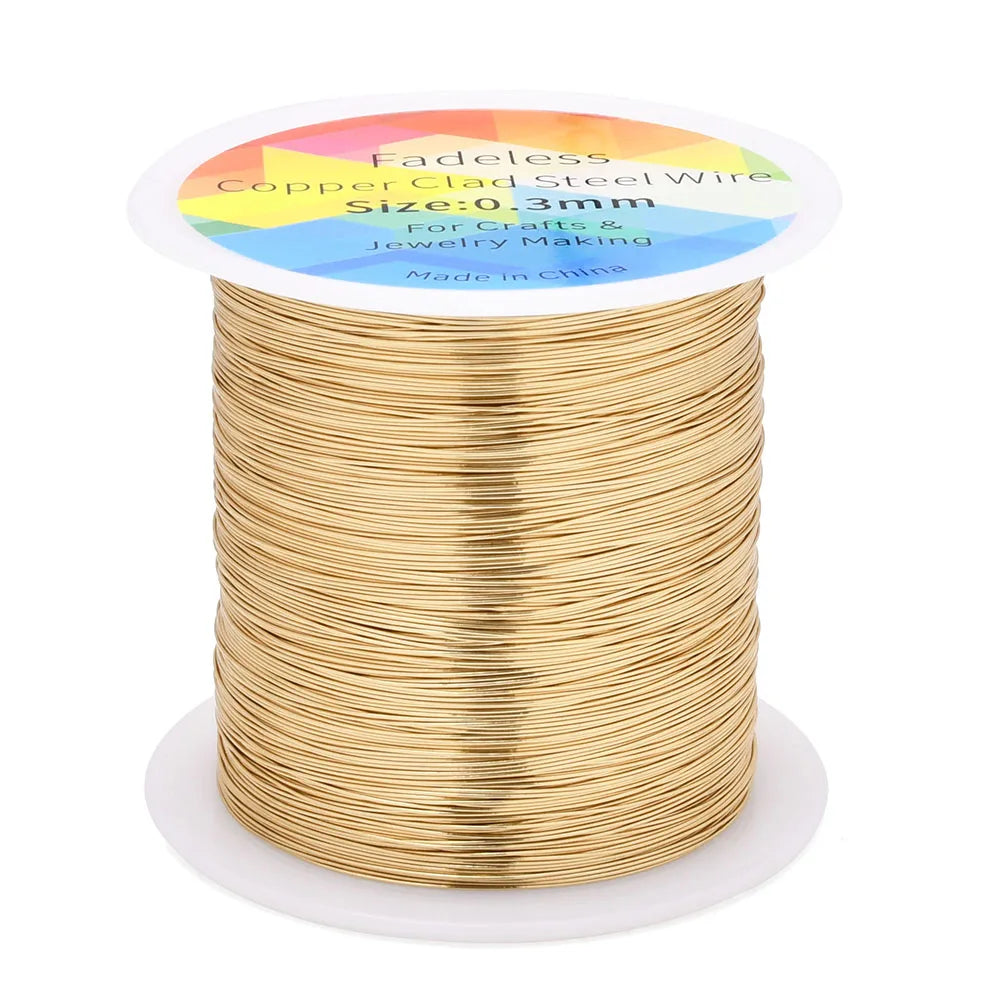 Spool of gold-colored copper clad steel wire for crafts and jewelry making