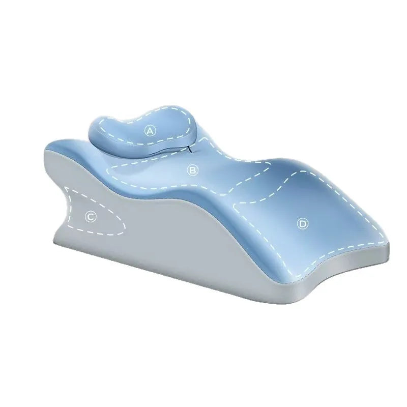 Light blue ergonomic memory foam wedge pillow with a contoured shape and detachable head rest.