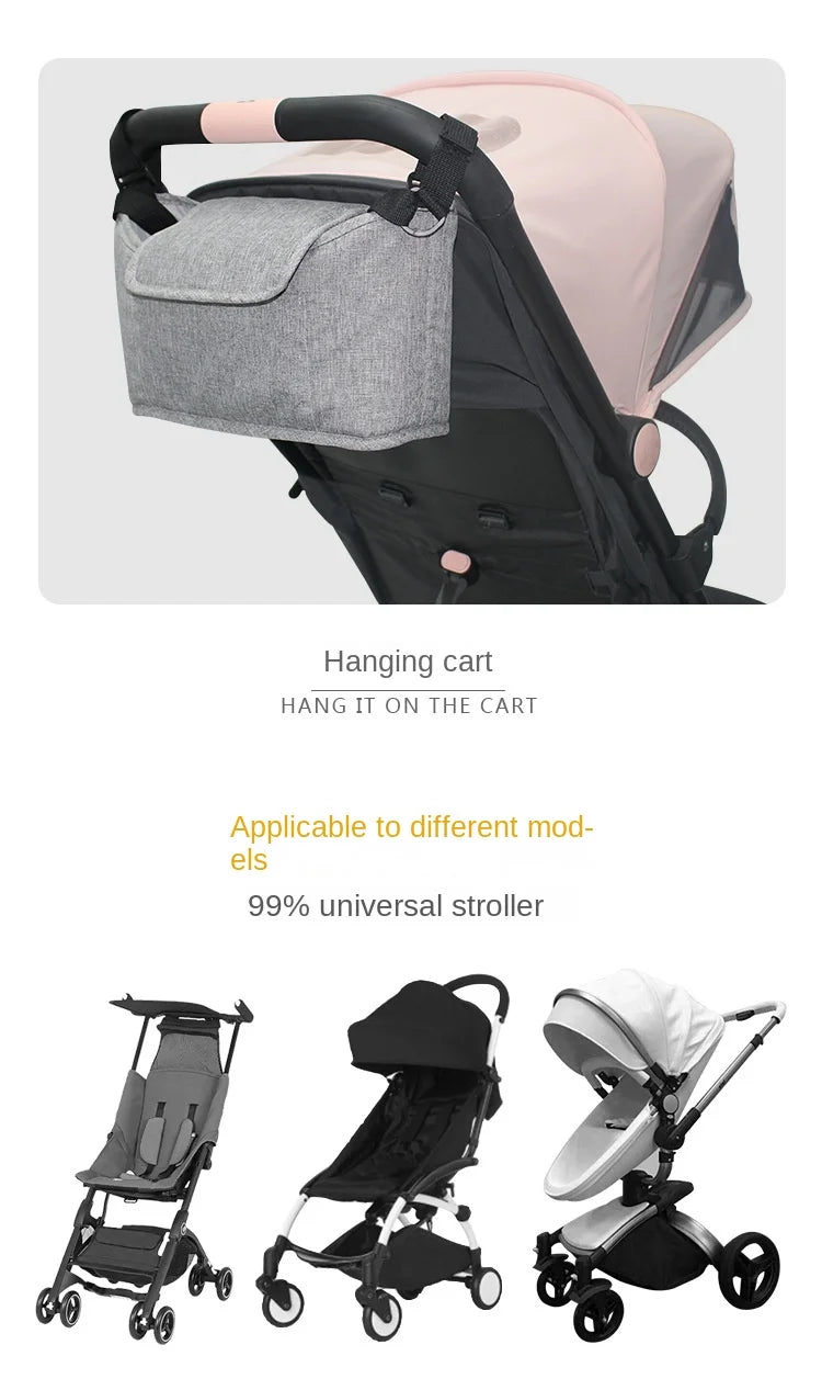 A pink stroller organizer bag with a grey fabric pouch is shown hanging on a black stroller cart.
