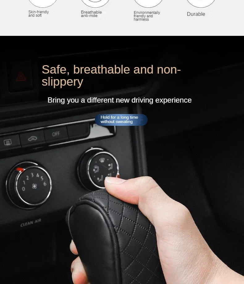 A hand is holding a black PU leather car gear shift cover, demonstrating its non-slip grip.