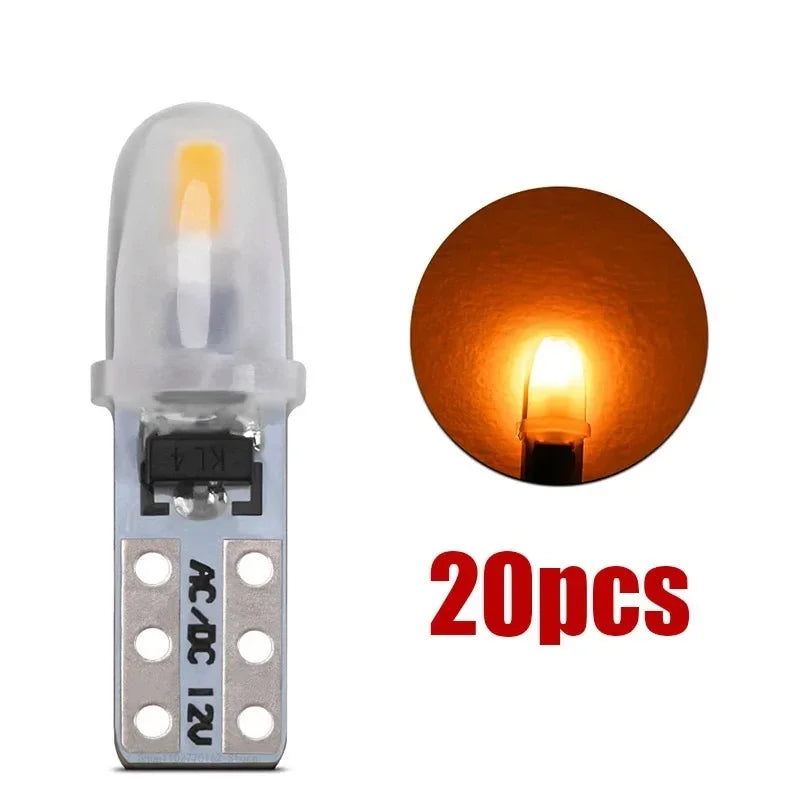A single T5 wedge LED bulb with a clear glass envelope and silver base is shown next to a circular image of the light emittin