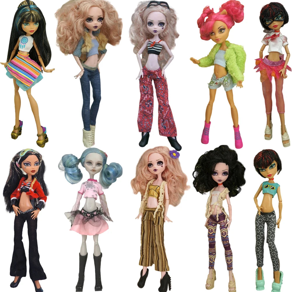 A collection of various fashion dolls dressed in colorful outfits and styled poses.