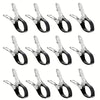 A set of six stainless steel pool cover clips with comfort grip handles.