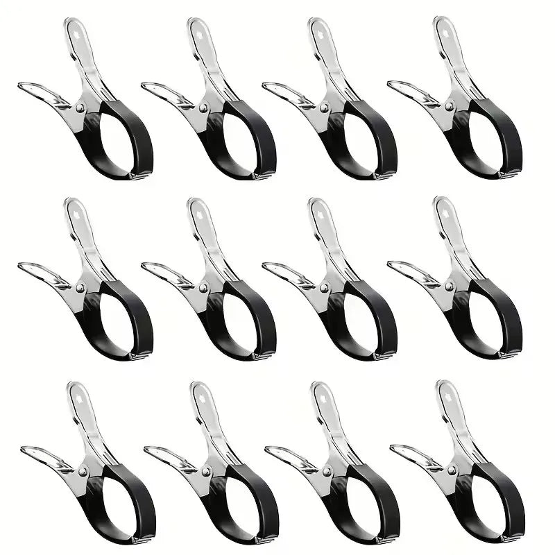 A set of six stainless steel pool cover clips with comfort grip handles.