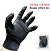 A black heavy-duty disposable nitrile glove with a diamond texture shown on a hand.