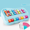 A blue plastic xylophone piano set with colorful wooden bars and a mallet, designed for toddlers.