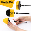 A yellow and black rotary cleaning brush set with an extension shaft is shown being used by a hand.