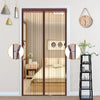 A magnetic screen door with a mesh curtain is shown in a bedroom setting.