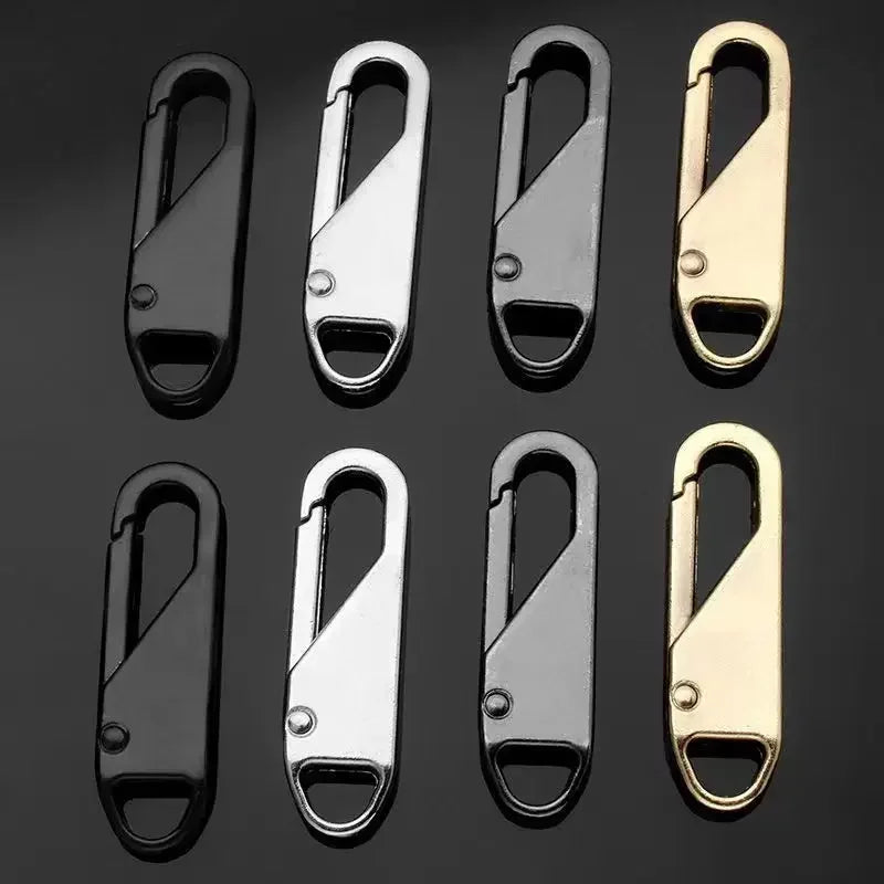 A set of eight universal metal zipper sliders or replacement parts shown against a dark background.