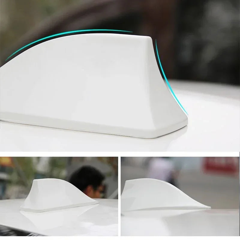 White shark fin car antenna with a blue accent, shown from the side and in close-up views.