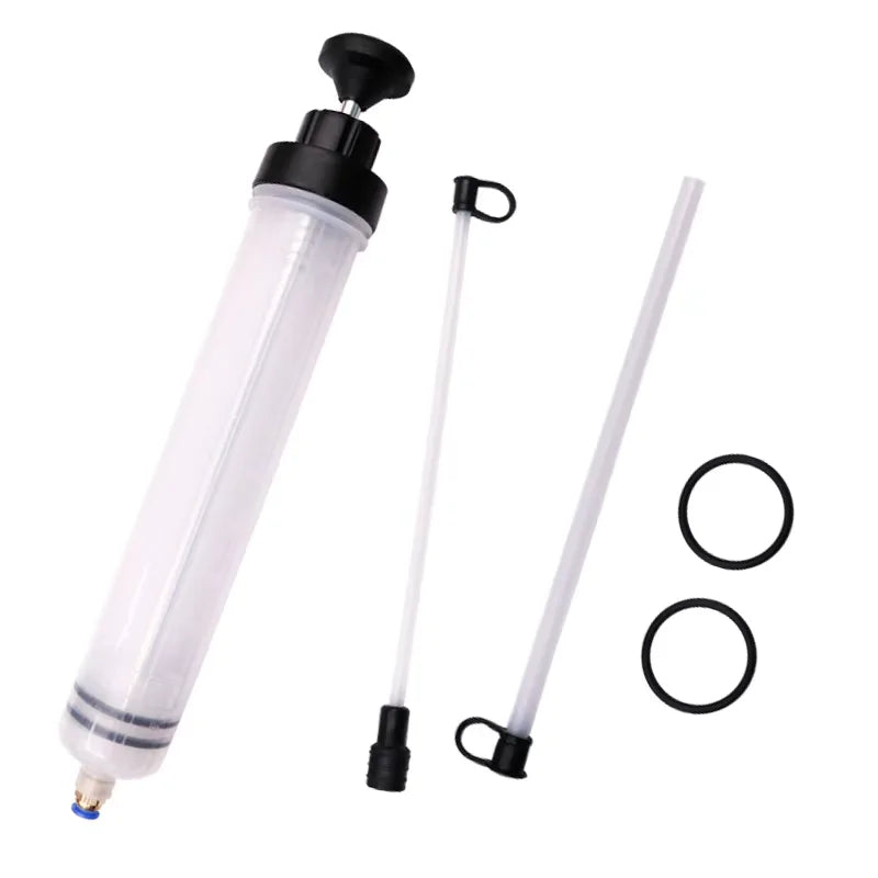 A clear manual fluid extractor and injection pump with a long white hose and fittings.