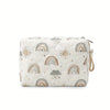 A cream quilted diaper caddy organizer featuring a rainbow print design with suns and clouds.