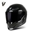 A black full-face motorcycle helmet with a clear visor and ventilation features is shown against a white background.
