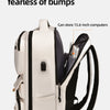 A beige and black computer layer backpack designed to be anti-collision and capable of storing 15.6-inch computers.