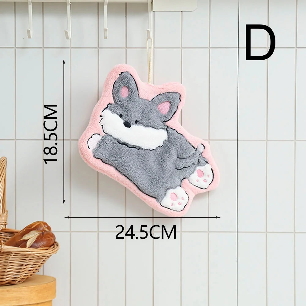 A gray and white cartoon dog hanging hand towel with pink edges, displayed against a white tiled background.