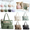 A variety of multi-color quilted puffy tote bags and laptop sleeves in shades of pink, green, beige, and black.