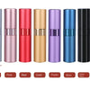 A row of refillable aluminum perfume atomizers in various colors including silver, pink, red, gold, purple, blue, bright blue