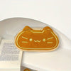 Caramel cat plush pencil case with large capacity shown in a light beige color.