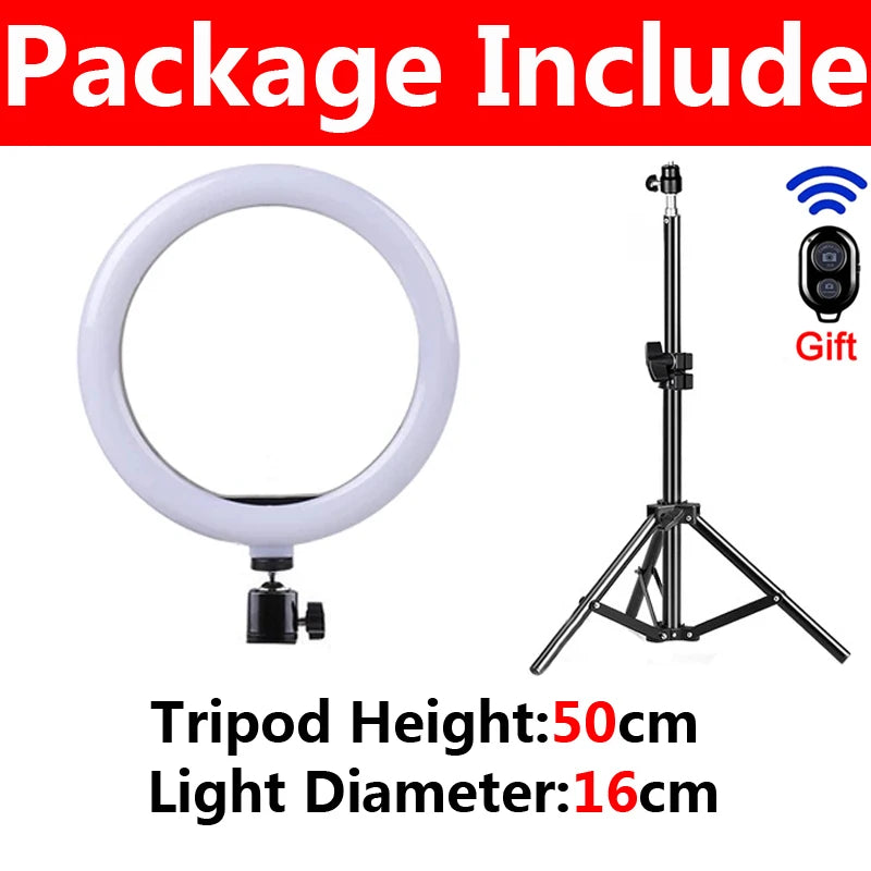 A white selfie ring light with a tripod stand and phone holder.