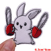 White cartoon rabbit embroidered iron-on patch with red accents