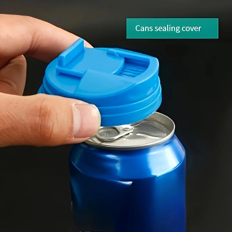 A hand is placing a blue sealing cover onto a blue beverage can.