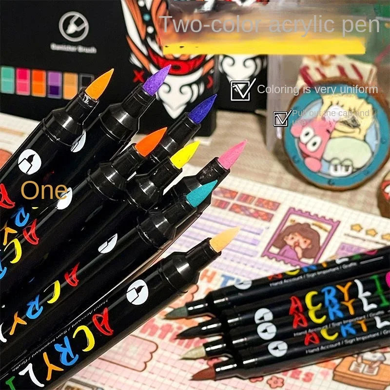 A close-up of a set of black dual-tip acrylic paint markers with various colored tips arranged for art and craft.