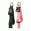 A black durable polyester luggage strap with a pink ID tag and metal loop.