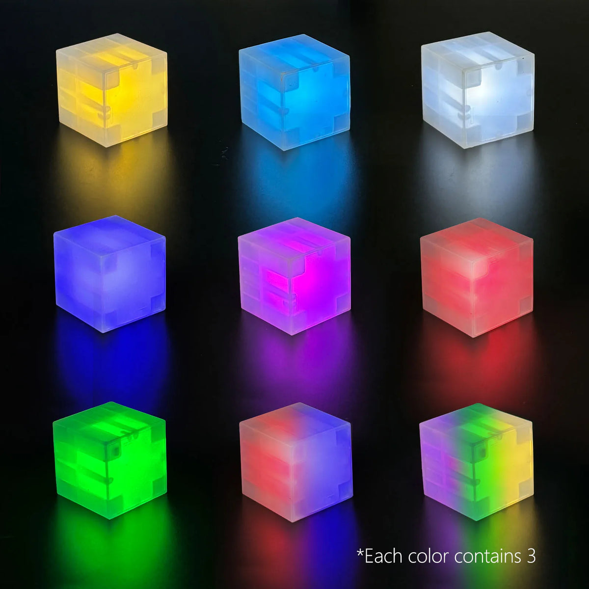 A collection of magnetic LED building blocks in various colors including yellow, blue, cyan, purple, pink, red, green, and li