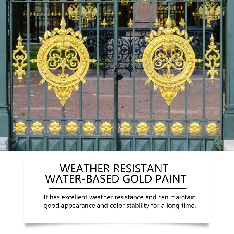 A pair of ornate gold-colored metal doors with decorative ironwork and foliage patterns.