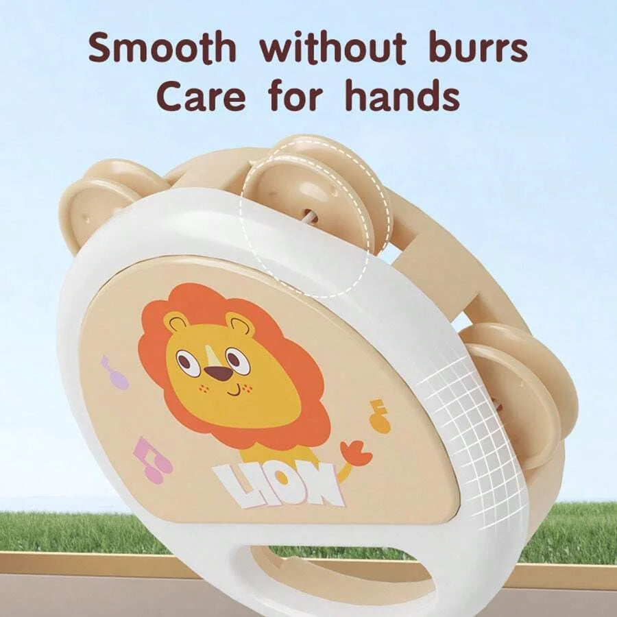 A white animal-shaped clapping tambourine with a lion design is shown for hands.