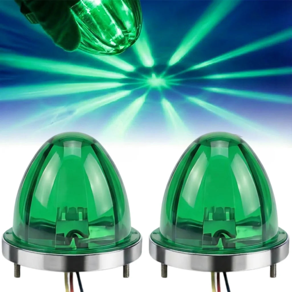 Zwei grüne Wassermelonen-LED-Markierungslichter mit silbernen Sockeln vor blauem Hintergrund