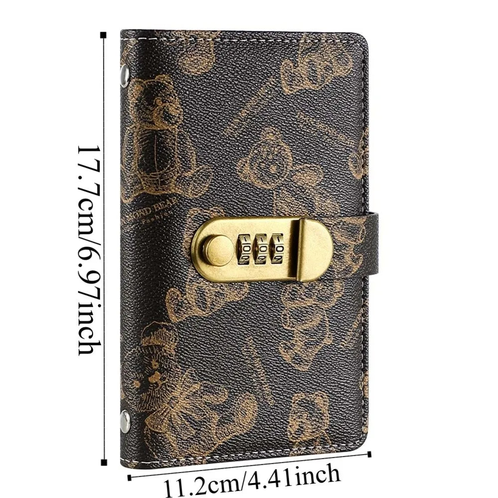 A black leather lockable money organizer notebook featuring a gold-colored bear design and code protection.