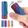 A hand holds a spiky sensory fidget roller with various colors and textures, demonstrating 360 degree rotation.