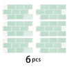 A set of six light mint green 3D waterproof peel-and-stick kitchen wall tiles arranged in a grid.