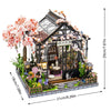 DIY miniature Japanese sakura tea house wooden kit featuring a detailed facade and LED lighting