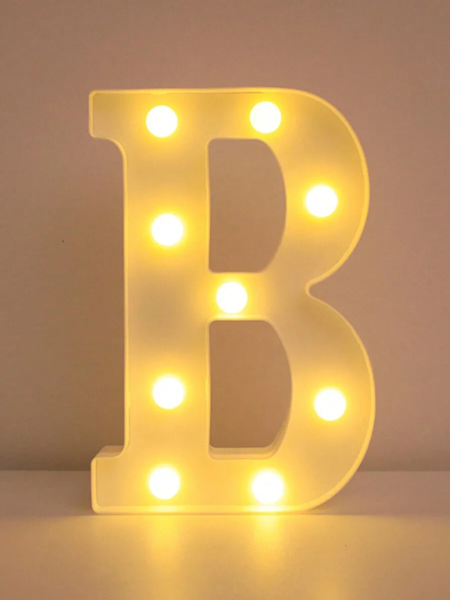 A glowing yellow LED letter B night light shaped for home and party decor.