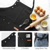 Black cotton canvas apron with an adjustable strap, three pockets, and long waist ties displayed on a white surface.