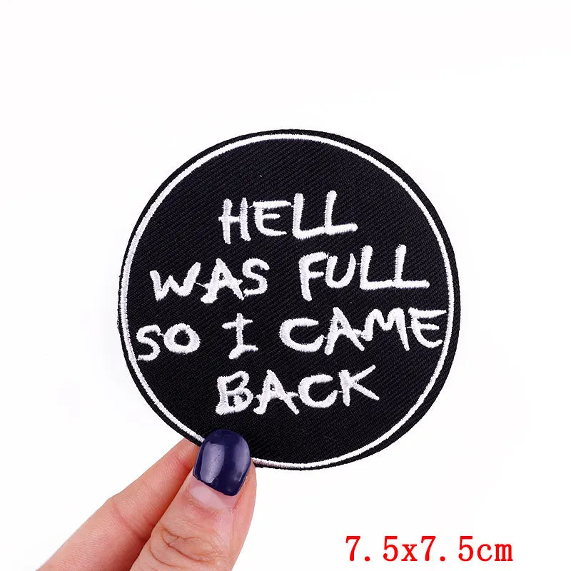 Black embroidered iron-on letter patch with white text that reads Hell was full so I came back