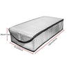 A rectangular attic stairway insulation cover made of silver foil material with black trim.