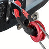 Close-up of a synthetic winch rope soft shackle and recovery ring kit attached to a black metal bracket.